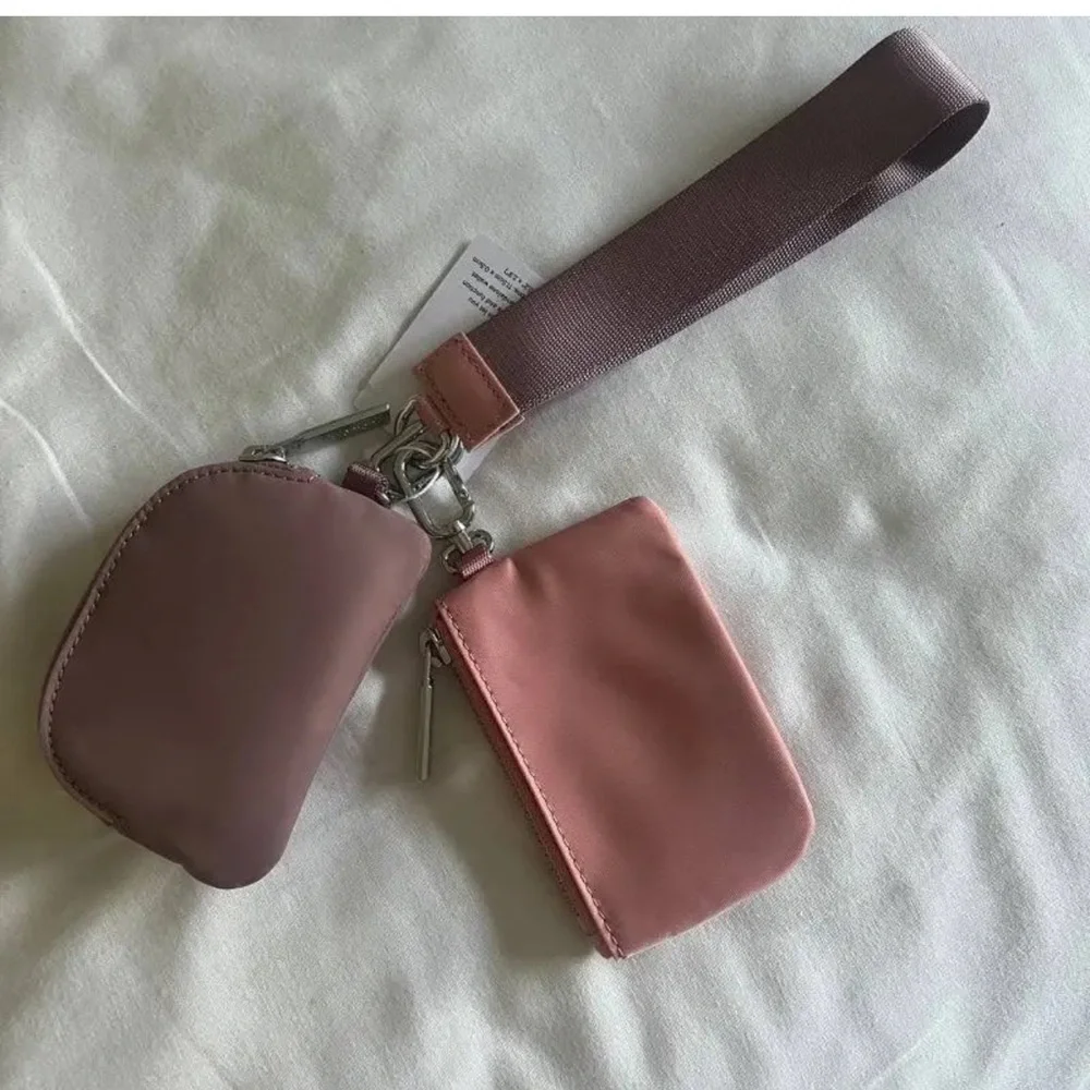 NWT 🍋 Lululemon Wisteria Purple and Twilight Pink Dual Pouch Wristlet